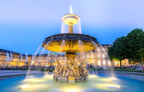 Картинка небо, деревья, огни, люди, дома, вечер, Германия, площадь, фонтан, Stuttgart city center