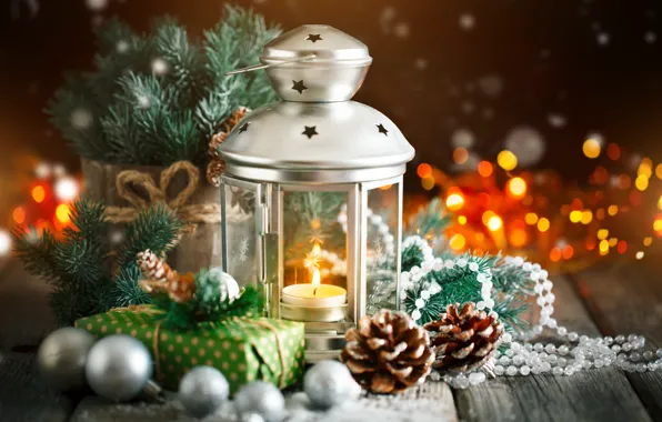 Картинка праздник, подарок, игрушки, лампа, новый год, рождество, свеча, ветка, ели, шишки, композиция